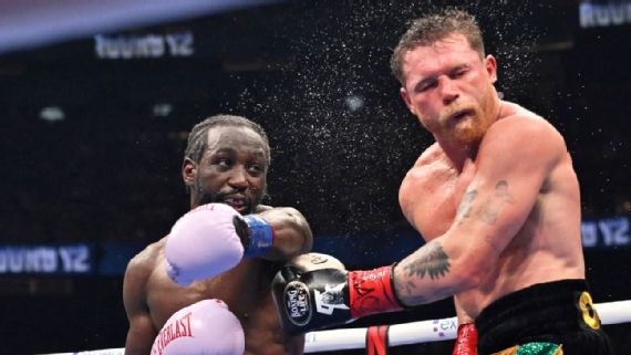 Crawford defeats Canelo, makes boxing hi...